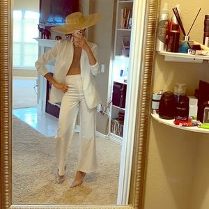 White, satin pant suit $160, Cinderella mules $140